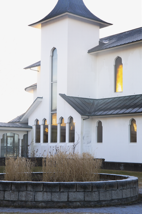 Free A contemporary church facade in Reykjavik, Iceland, captured in soft light. Stock Photo