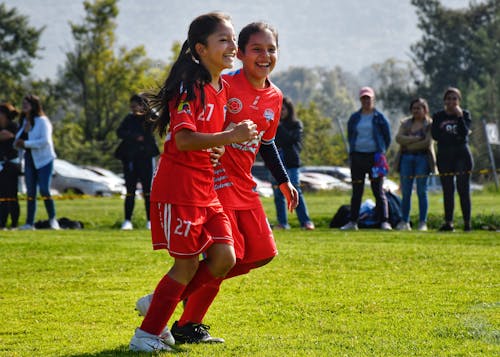 Little Girls Playing Football 