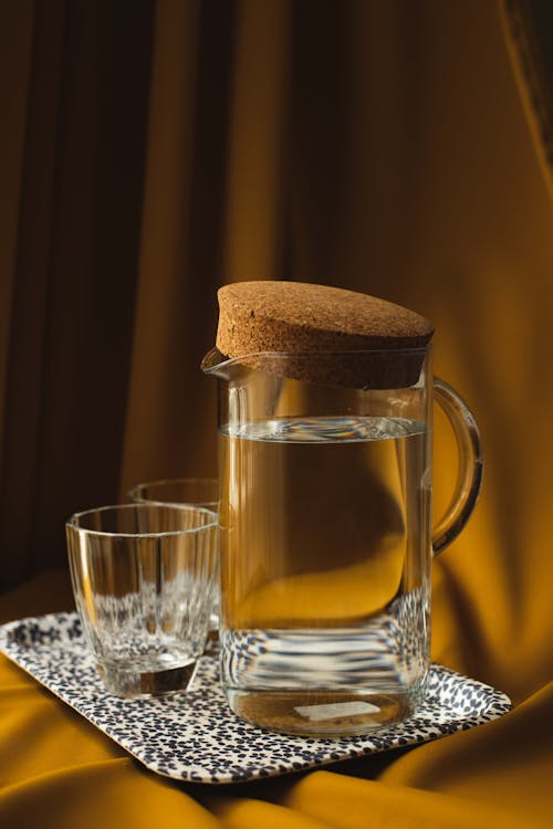 Glasses and Glass Jug on Tray