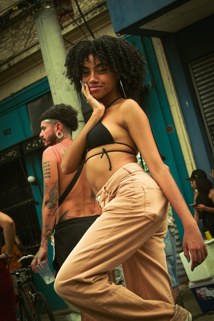 Young Woman Dancing On Street Festival