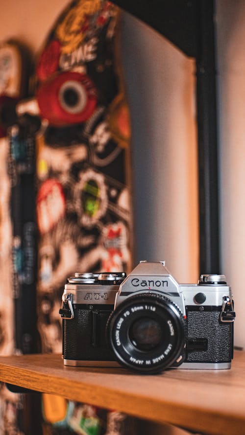 Canon Camera on a Wooden Counter Top 