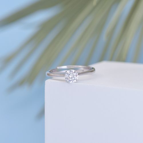 Free Close-up of a diamond ring on a minimalist background, epitomizing luxury and elegance. Stock Photo