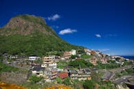 Assorted-color Concrete Buildings Near Mountain