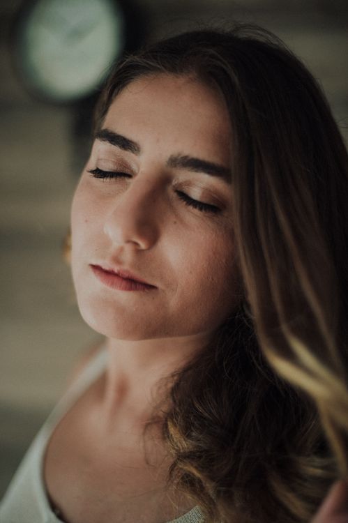 Peaceful woman with clear glowing skin monsoon skincare routine