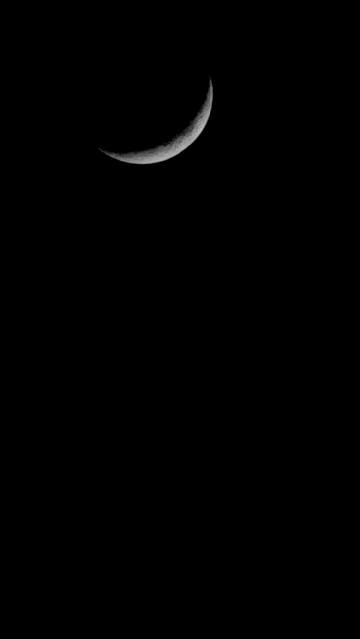 A clear view of a crescent moon against a dark night sky.. clear, view, crescent