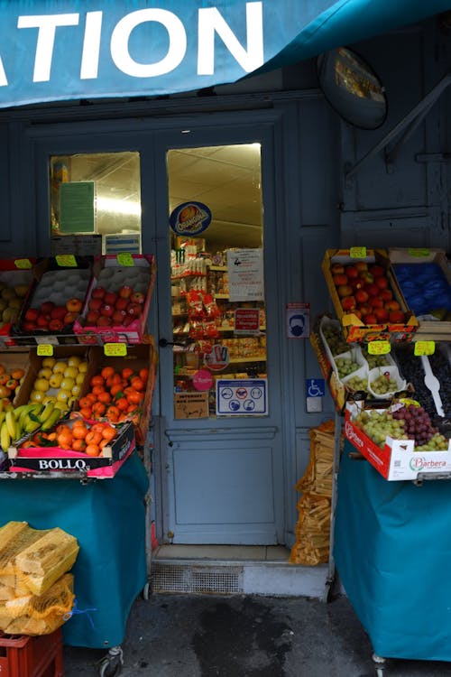 Grocery Store with Fruits and Vegetables Displayed Outdoors