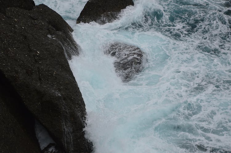 Sea Waves Crashing Against Rocks