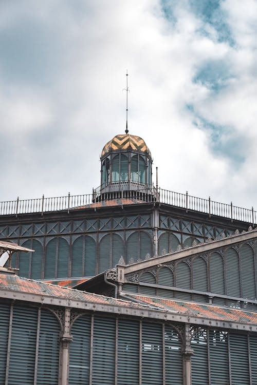 Traditional Building with Tower against Blue Sky