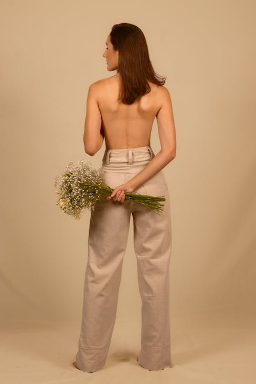 Shirtless Model Posing in Pants
