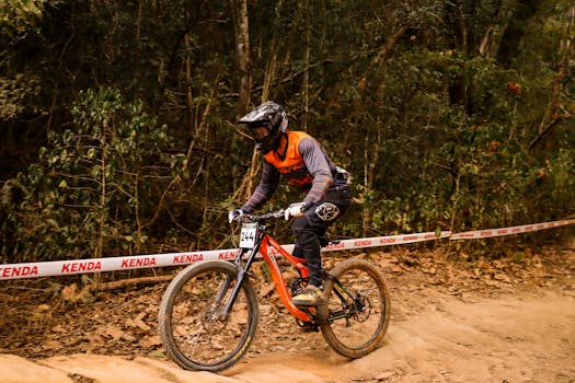 A mountain biker races through a forest trail during a competition in Simão Pereira, Brazil.