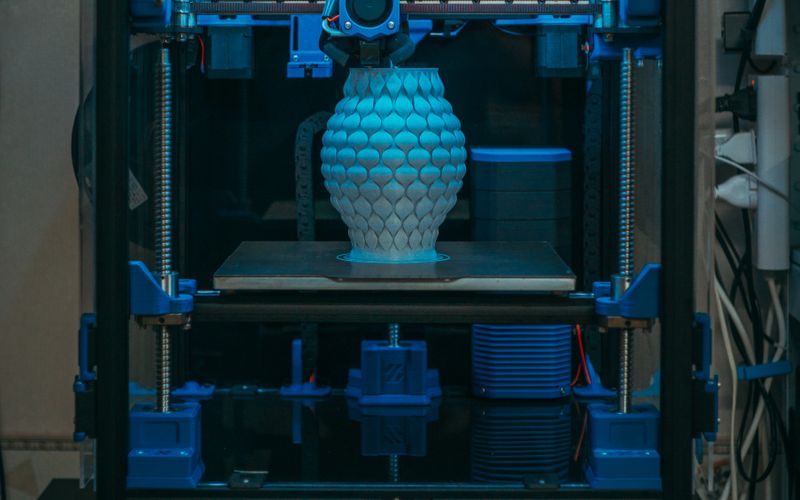 3D printer building a detailed part layer by layer