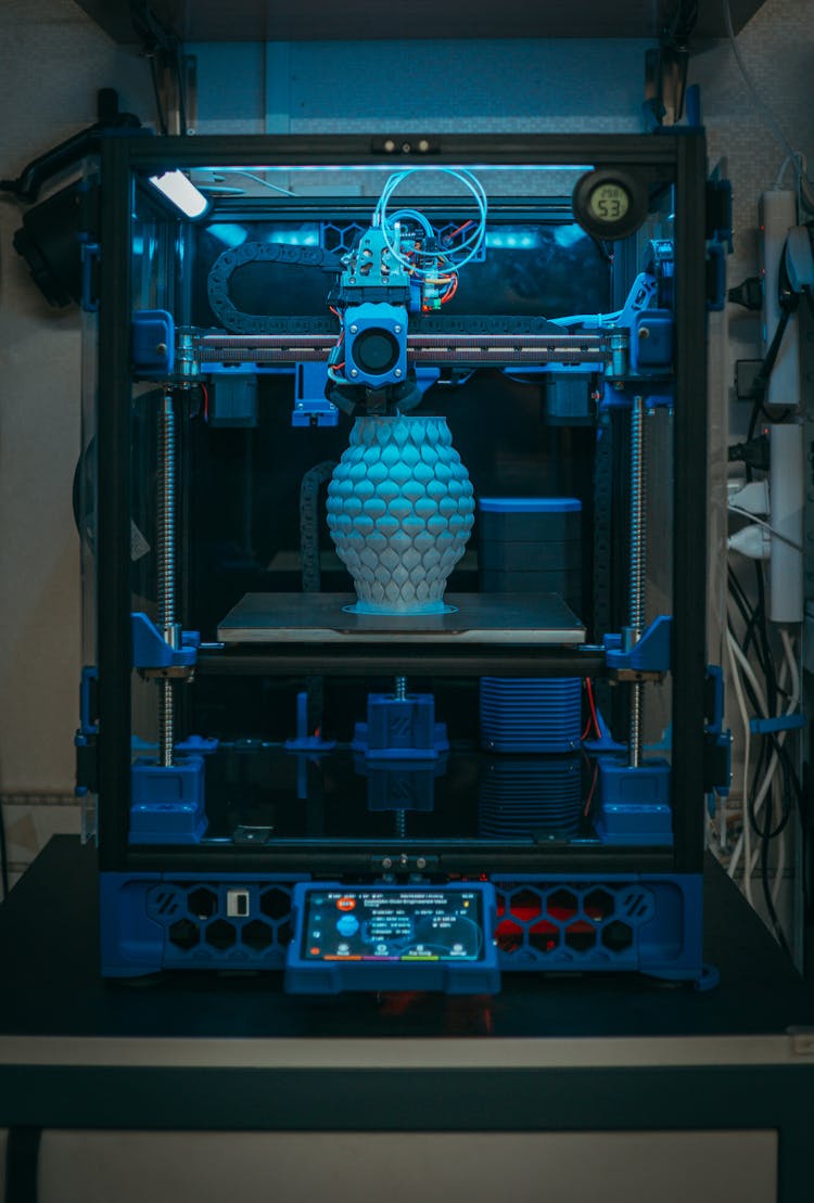 Photo Of A 3D Printer Printing A Vase