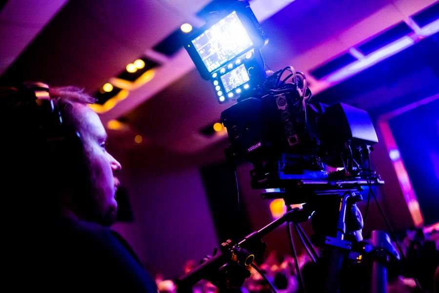 Professional camera filming a live event