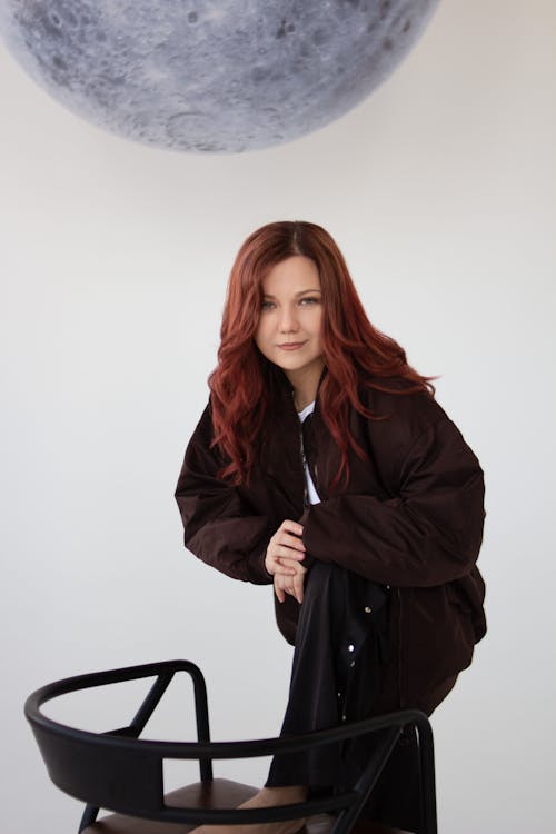 Photo of a Redhead Woman in Casual Clothes