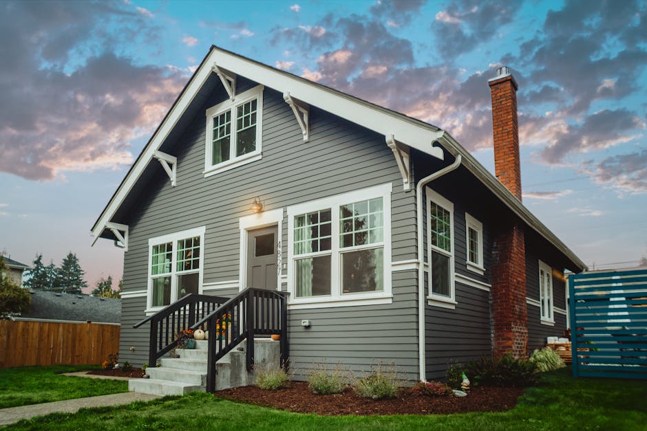 Gray House Under Blue and Gray Sky