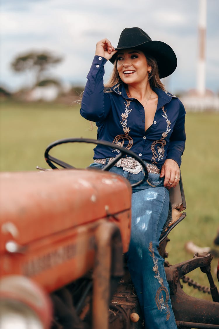 Brunette Woman On Tractor