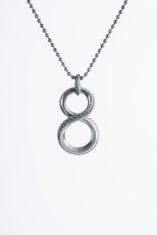 Silver Necklace on White Background