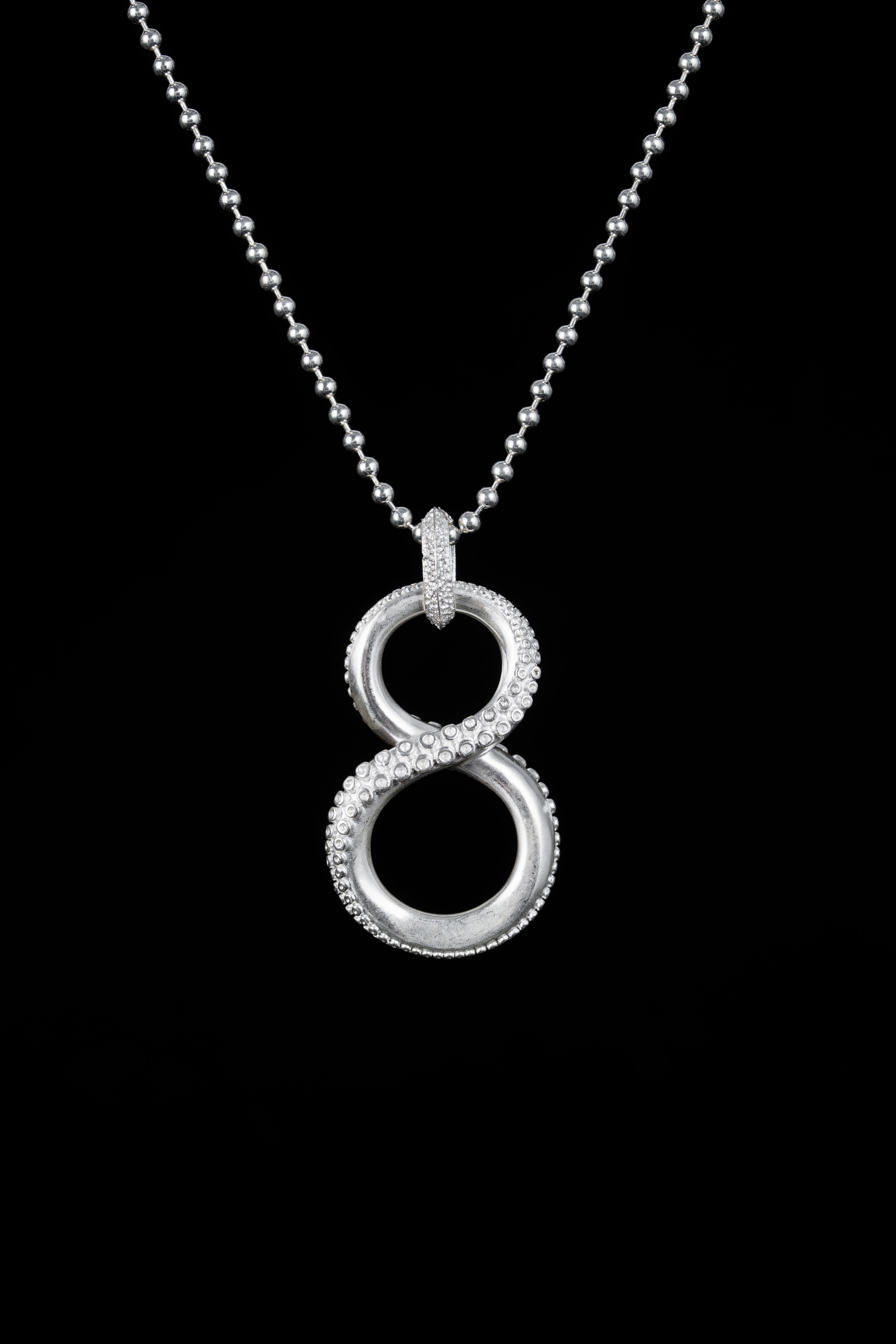 Silver Octopus Infinity Symbol Necklace · Free Stock Photo