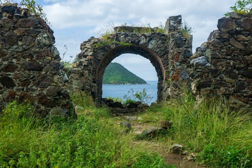 Ruins of Stone Walls and Gate on Shore