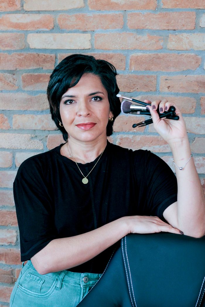 Makeup artist with brushes