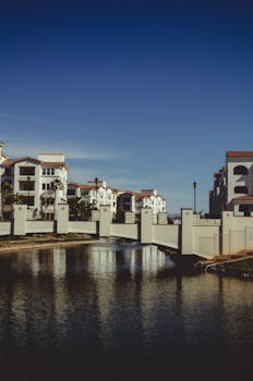 Scenic view of residential buildings and bridge over canal in Chandler, Arizona.
