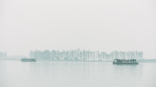 Boats on the Lake in Fog 