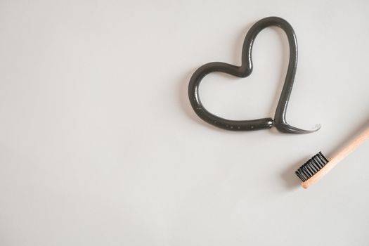 Heart Shape from Toothpaste over Toothbrush