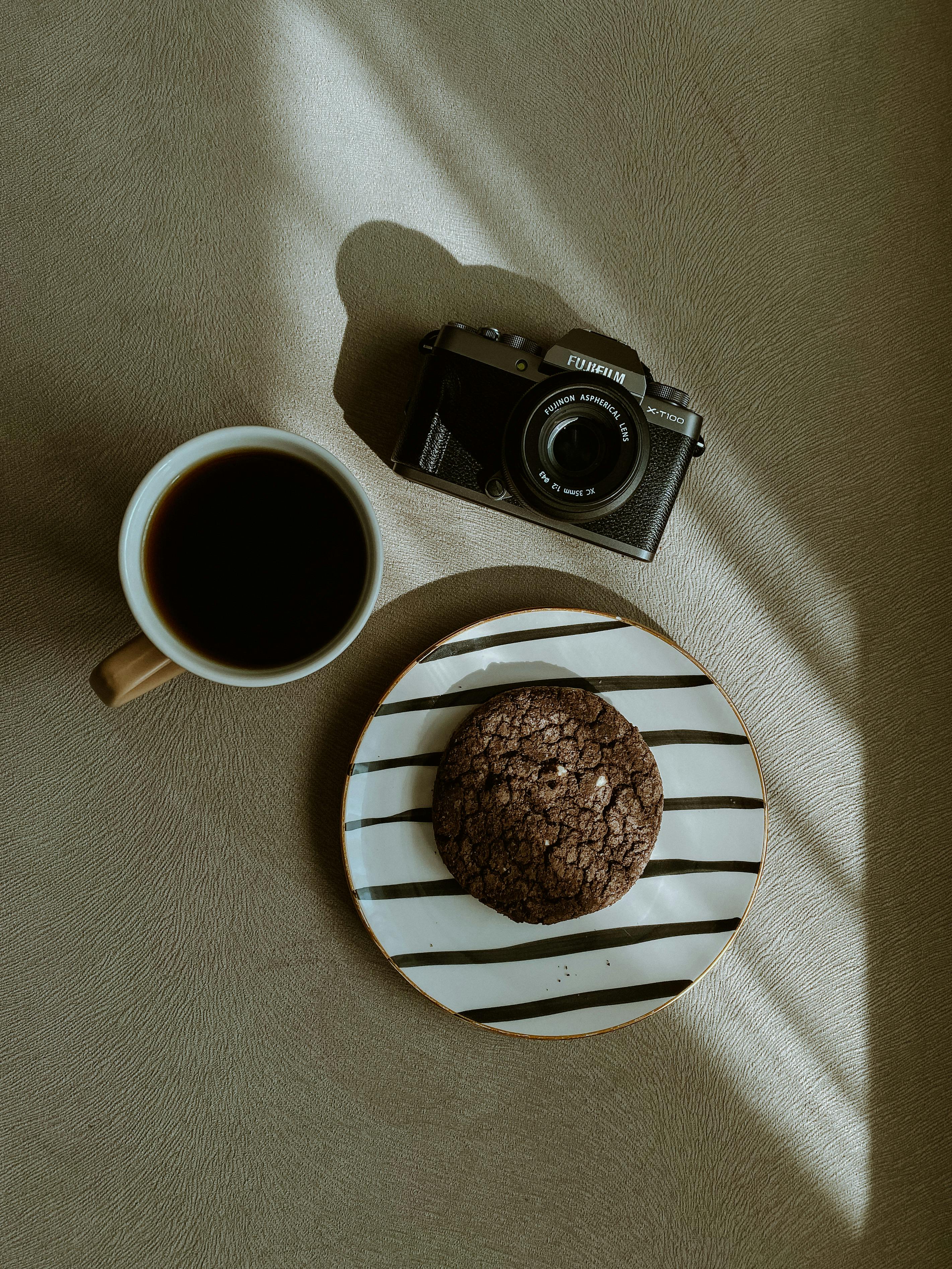 Cookie, Coffee and a Camera · Free Stock Photo, image size:2843x3790