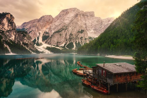 Boats and Wooden Cabin by Pragser Wildsee