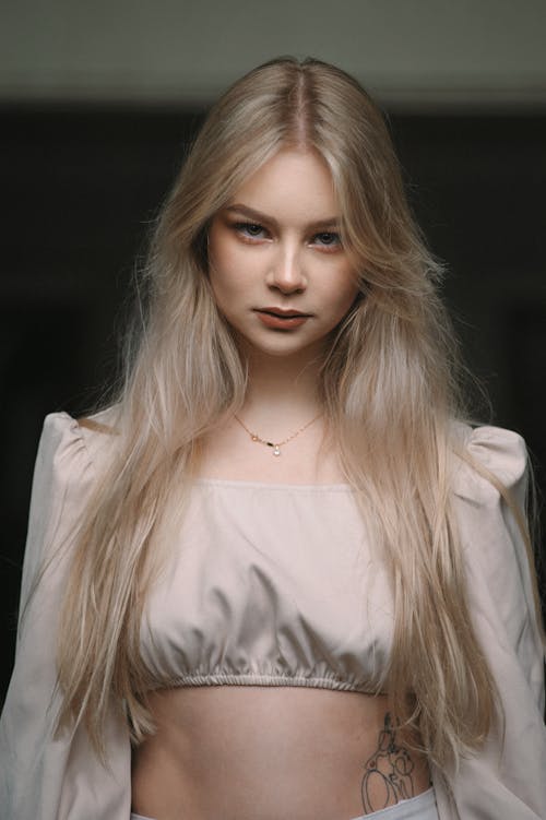 Portrait of Beautiful Young Woman with Long Hair