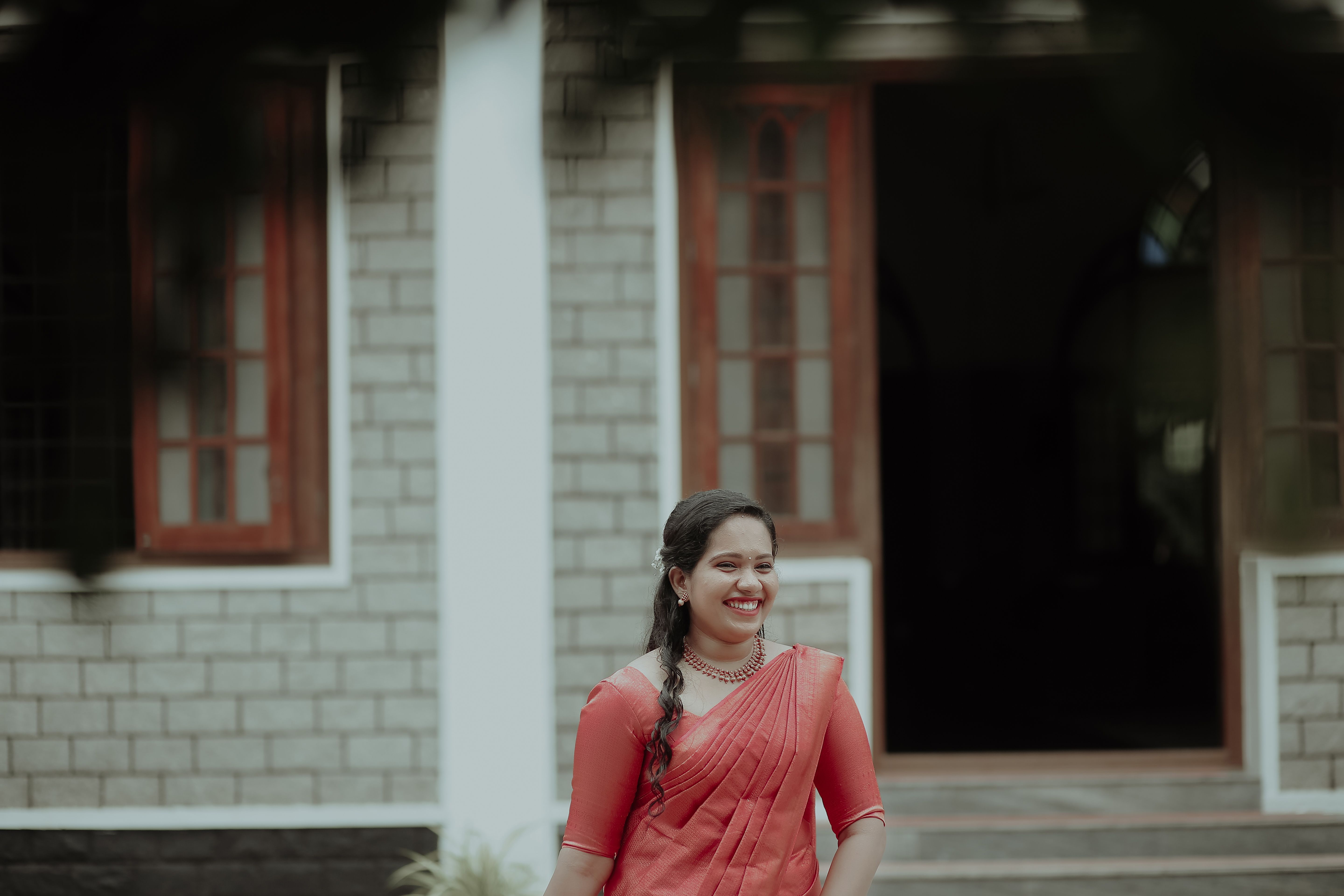 Smiling Woman Posing in Traditional Dress · Free Stock Photo