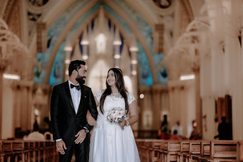 Newlyweds Standing in Church
