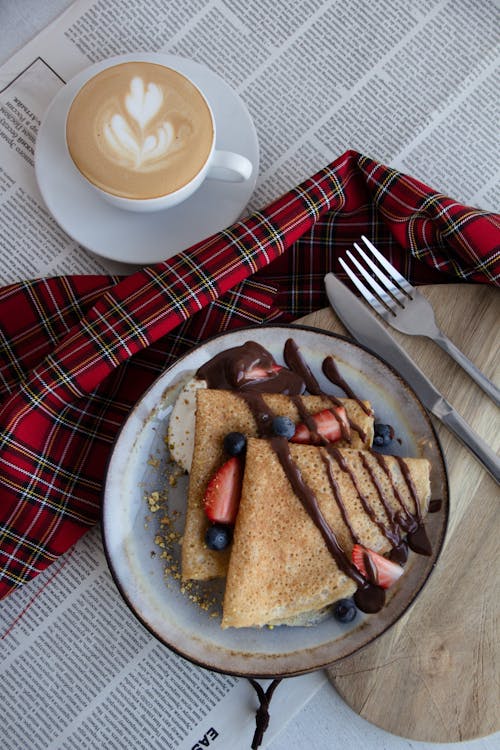 Free Pancakes on a Plate and a Cup of Coffee Stock Photo