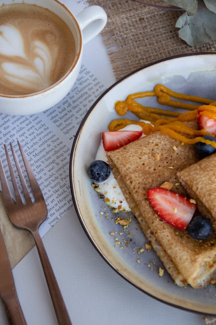 Dosa And Cup Of Coffee On The Table 