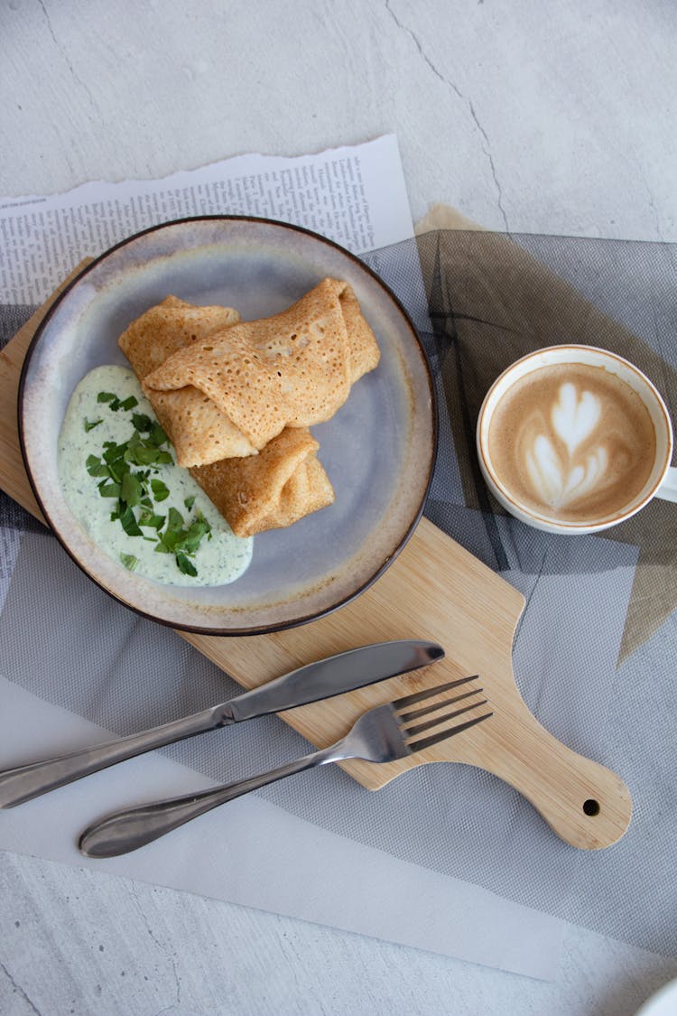 Indian Dosa And Sauce On The Plate 