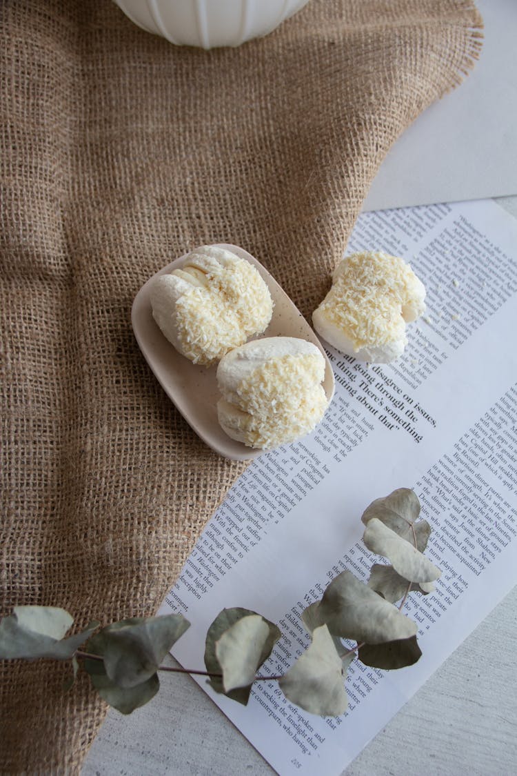 Macaroons In A Sprinkle Of Coconut Flakes