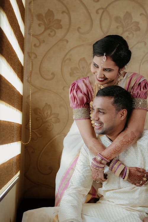 Woman Embracing a Smiling Man