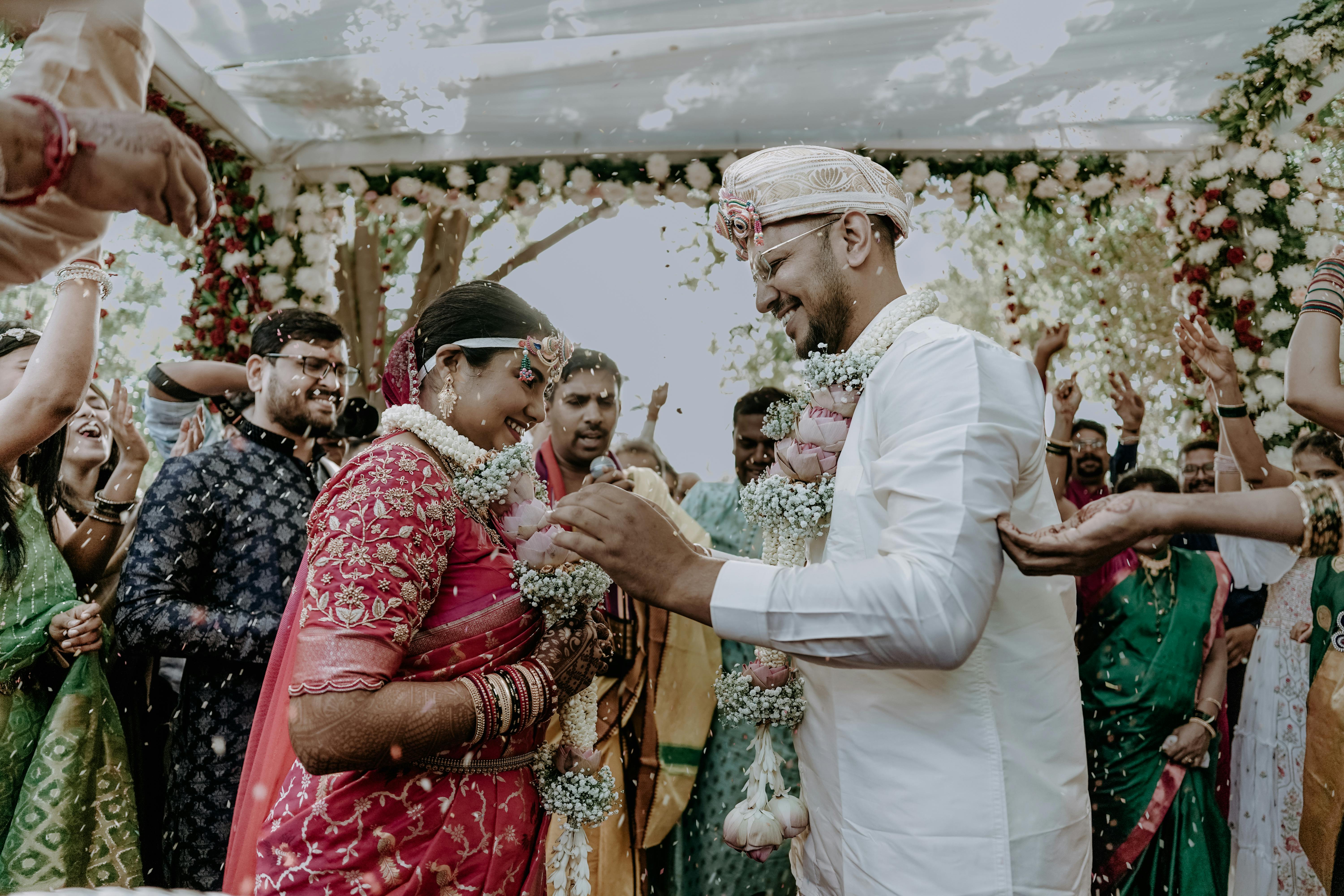 Guests Throwing Rice at Newlywed · Free Stock Photo