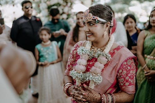 Smiling Bride among Guests