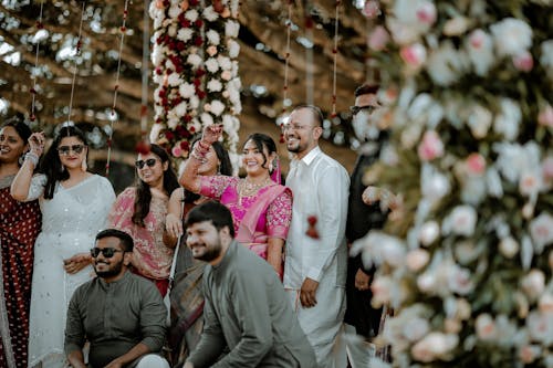 Newlywed Couple with Wedding Guests