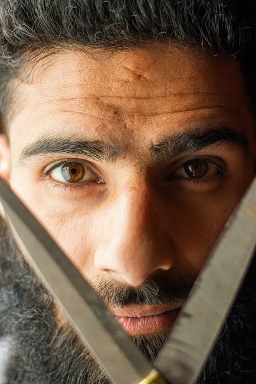 Portrait of a Bearded Man with Scissors