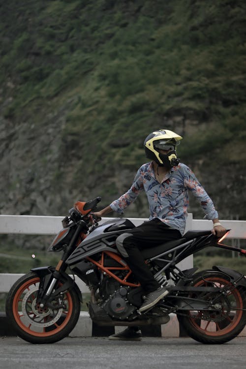 Man in Helmet on Motorbike