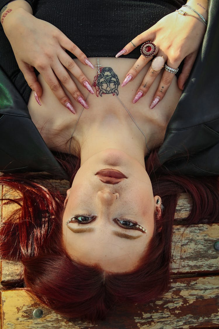 Redhead Woman With Satan Tattoo