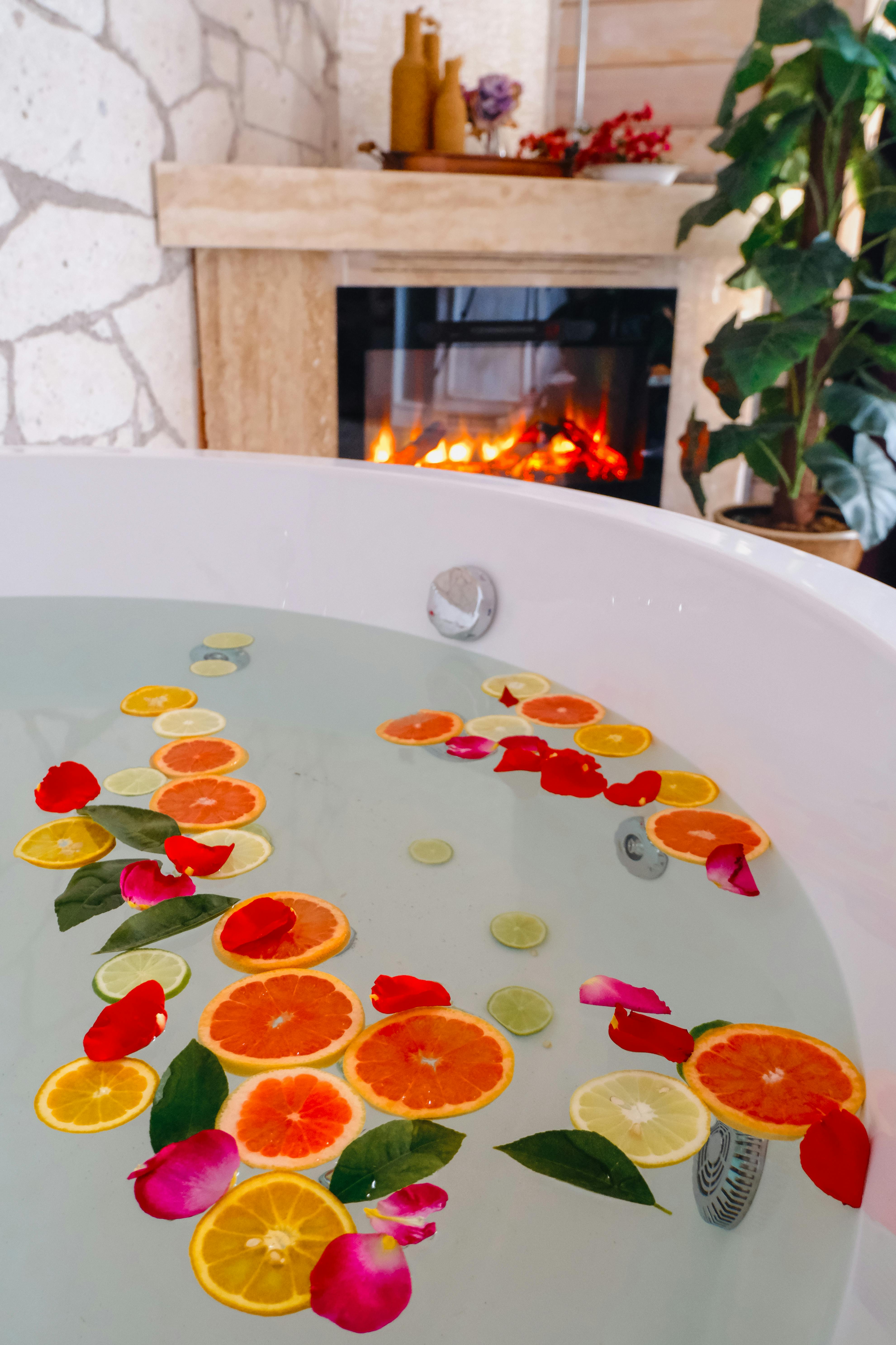 Petals and Fruits in Bath Water · Free Stock Photo