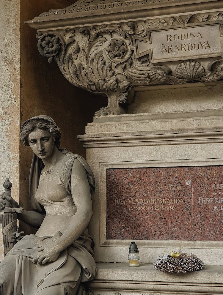 Candle And Sculpture On Family Repository