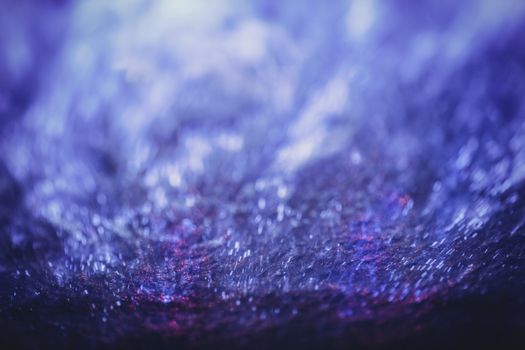 Abstract close-up of purple and blue textures with blurred effect.