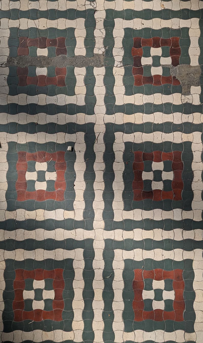 What Defines a Curved Marble-Pattern Tile?