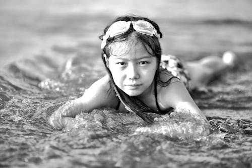Girl Wearing Goggles on Beach in Black and White