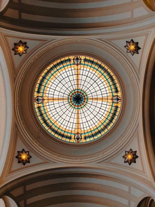 Free A stunning stained glass dome with geometric patterns in a Brazilian interior. Stock Photo