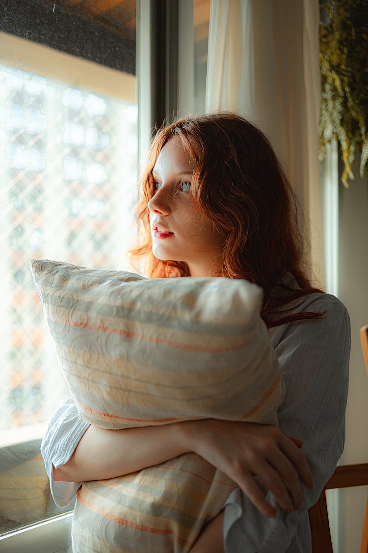 Portrait Of Woman With Pillow